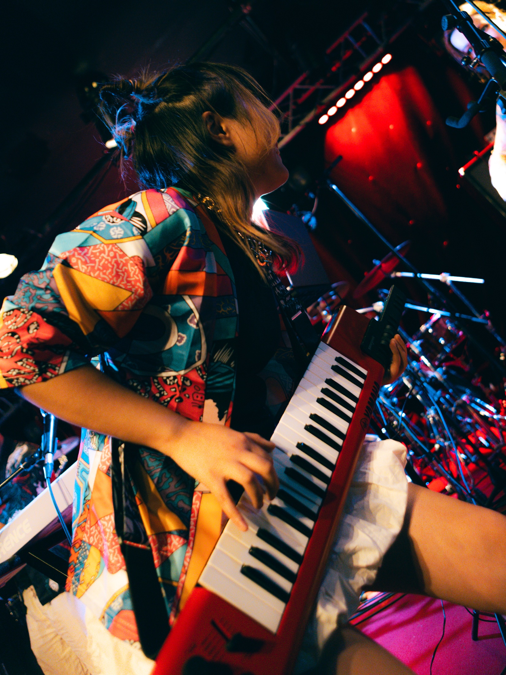 TC.KYLIE playing red keytar at New Morning, Paris